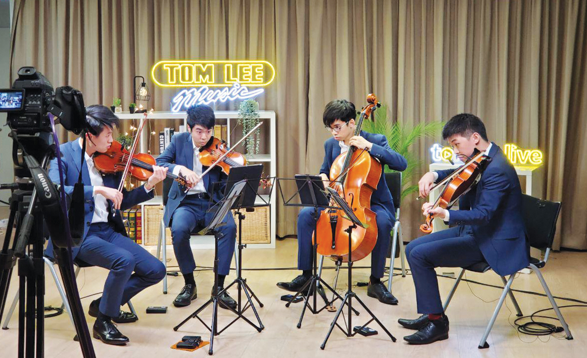 Cong Quartet: (from left to right) Chow Yip Wai, violin; Chik Yiu Ting, Francis, violin; 
Cheng Yan Ho, cello; Caleb Wong, viola (Photo credit: Tom Lee Music.)