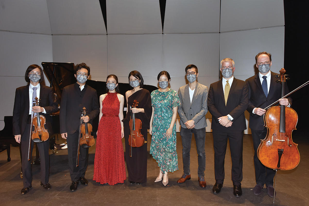 From left to right: Le Hoai-nam, violin; Andrew Ling, violin / viola; Colleen Lee, piano; Kaori Wilson, viola; Julie Kuok, pianist/ composer; Elliot Leung, composer; John Schertle, clarinet; Laurent Perrin, cello. Photo credit: RTHK